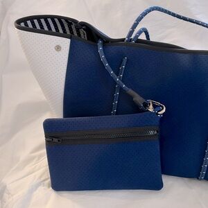 New Haute Shore navy and white neoprene tote with striped interior.